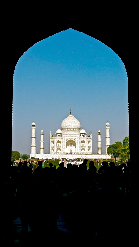 Arched gateway leading to the Taj Mahal